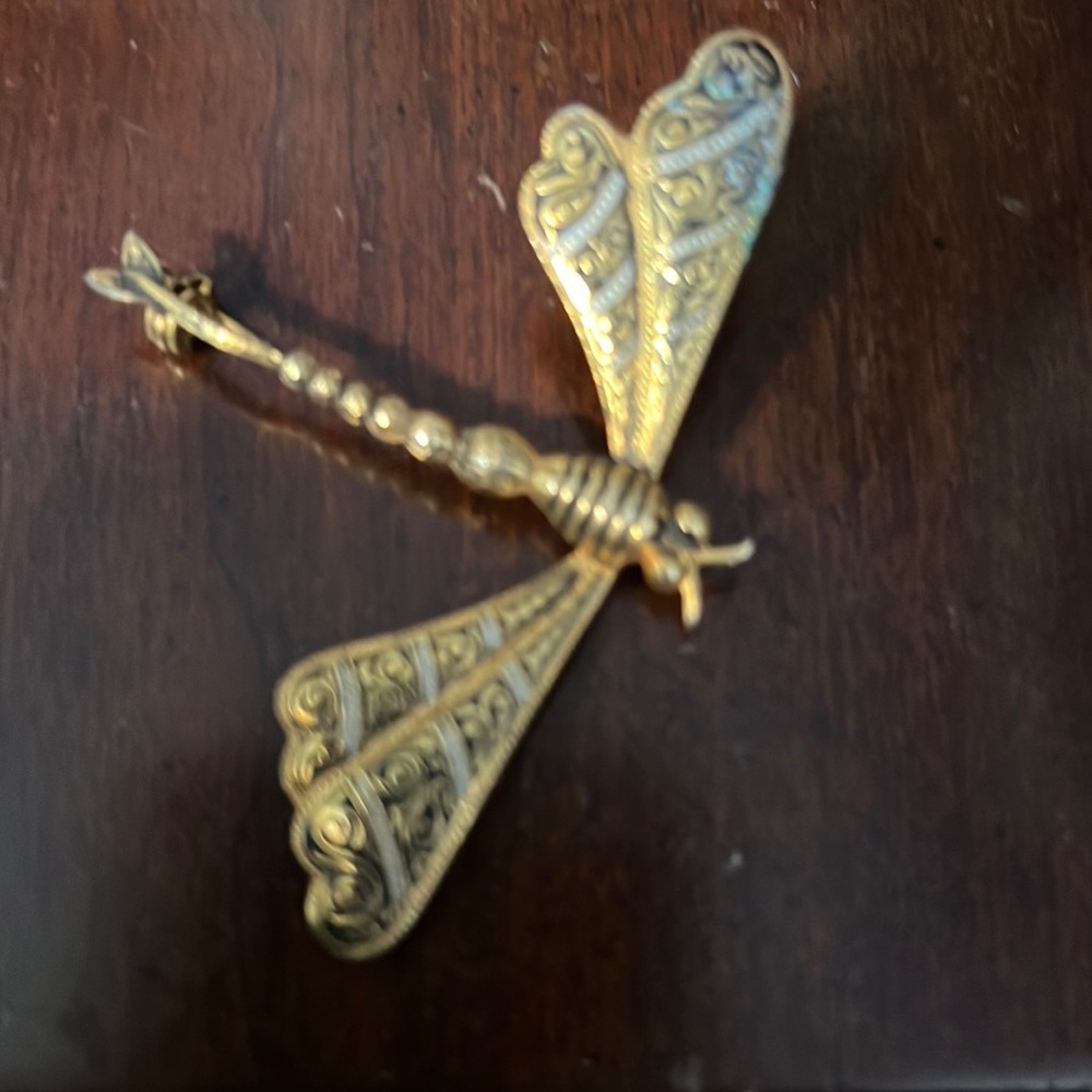 Vintage dragonfly pin no markings, black, white, gold, some issues with the meta